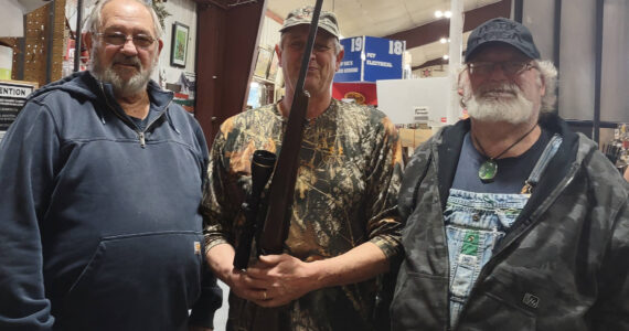 There were smiles all around on Saturday, December 7, when Forks American Legion Post 106 held the drawing for its annual Rifle Raffle fundraiser. Pictured left to right are: Howard Goakey, Post financial officer; Mark Rabin, the raffle winner; and Bubba Bolin, Post commander. Post 106 member Joe Wright congratulated Rabin on his new hunting rifle and thanked him for his support.
Submitted photo