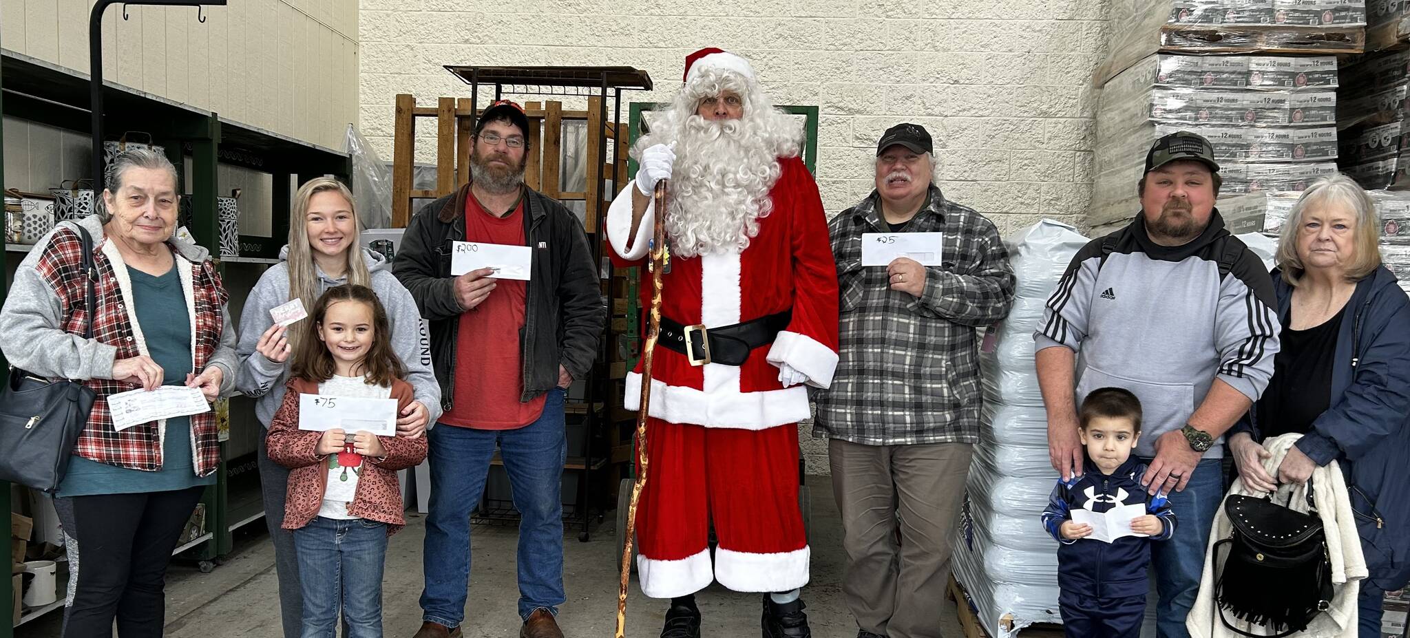 The last WEBPA Santa Bucks drawing was held on Saturday, Dec. 21 outside Outfitters. The winner of $200 in Santa Bucks was Charles Anderson. Gabby Salsgiver was the happy winner of $75 in Santa Bucks and Harold Curtis won $25 in Santa Bucks. Winners of Outfitters gift cards were Zoie Davis, Sherry Rosander and Jackie Louthin. Sully’s gift certificates went to Sarah Warner, Lynda Rowland and Carla Fernandez.
After the regular drawing the WEBPA $500 Shopping Spree drawing was held. The winner this year was Bill Peach. Congratulations to Bill and thanks to all who purchased tickets. Money raised from the sale of the Shopping Spree tickets fund the turkey give-a-ways, the Santa Bucks and the Shopping Spree. Any extra funds raised are used to maintain and purchase the downtown Christmas lights. | Submitted photo