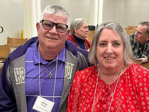 Warren Johnson is with his wife Cathy at the annual meeting.