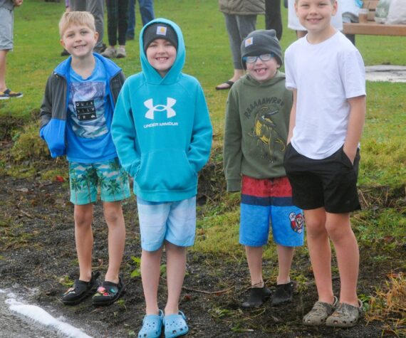 Photo by Lonnie Archibald
All smiles before …Several youngsters were amongst those who took to the waters at Lake Pleasant Clallam County Park on New Year’s morning. Pictured here are just a few of those who were ready to take the plunge braving the cool waters.