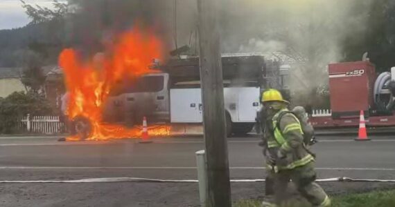 First responders were kept busy last Thursday morning when shortly after a log truck wreck south of town a call came in for a vehicle fire in the 1100 block of Calawah Way. PUD crews were setting up for an ongoing pole replacement project when a passerby spotted flames under the vehicle. CCFPD#1 responded and quickly knocked down the flames. The truck appeared to be a total loss.
Photo/screenshot from video by Lucas Larson