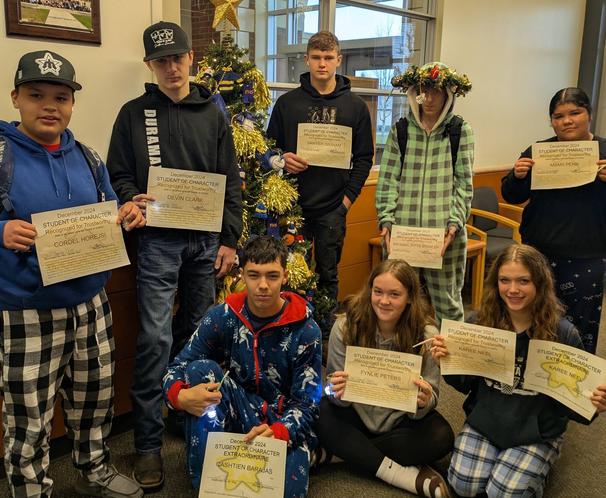 Submitted photo
Forks High School staff recognized the following students for the Student of Character trait - Trustworthy, “Able to be relied upon to be honest and truthful.”
Standing L to R- Cordel Horejsi, Devin Clark, Sawyer Graham, Michael Pitts-Stanley, Amari Penn, Seated-Castien Barajas, Fynlie Peters, Karee Neel. Not pictured Rayna Dawkins. Three of these students were recognized for Student of Character “Extraordinaire” for stepping up and being calm during a classroom emergency. They were Karee Neel, Cashtien Barajas, and Rayna Dawkins.