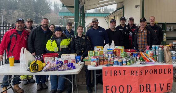 Supporting the community! As highlighted in Pat Soderlinds recent Chamber presentation, food drives are vital for helping support the food bank. Area first responders recently held two successful food drives, raising over $2,100 and collecting a generous amount of non-perishable food donations. Pictured here are just a few of the dedicated participants. Special thanks to Bruce Paul and Forks Outfitters for hosting and providing the space to make it all possible. Submitted photo