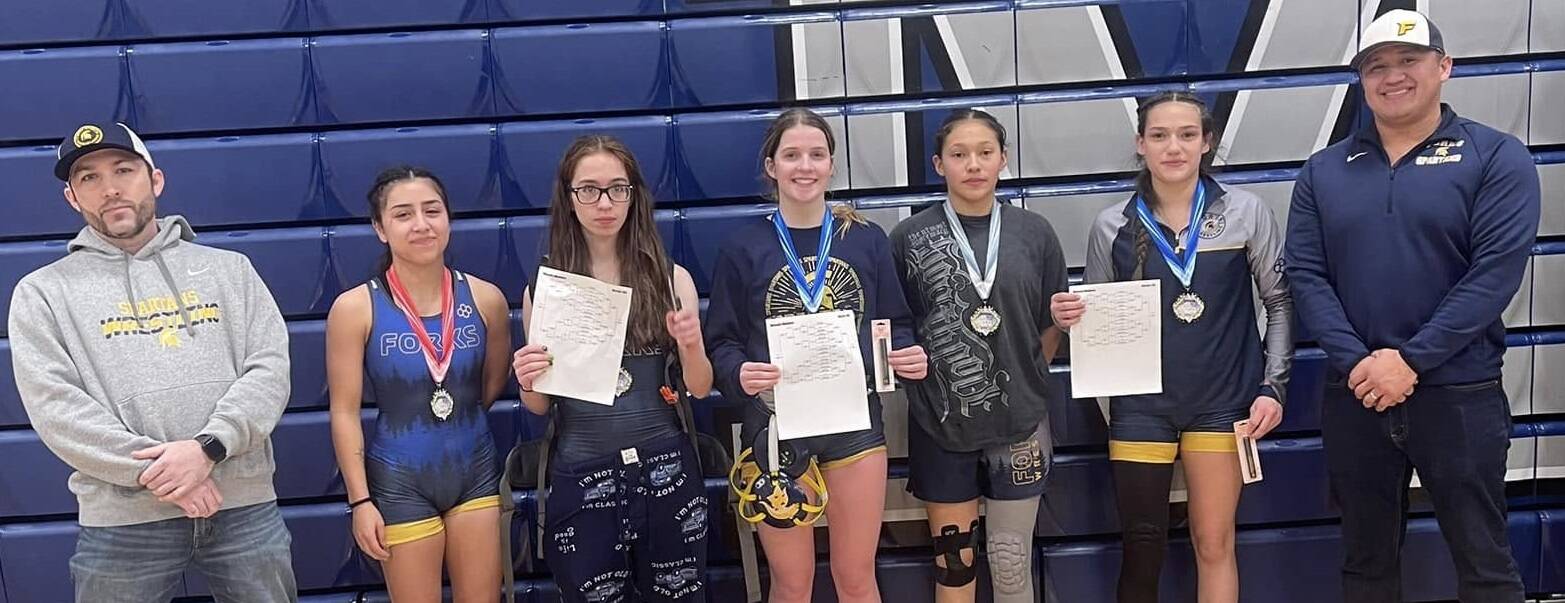 Photo Laci Johnson
(L-R) Coach Daniel Frishkorn, Lilly Galeana -2nd, Flora Horejsi - 1st, Peyton Johnson -1st, Larayne Blair- 3rd, Jade Blair - 1st, and coach James Salazar.	Not pictured - Kinley Rondeau who placed 1st.