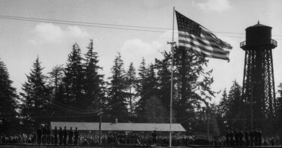 Dobyns collection
The Naval Auxiliary Air Station (NAAS) Quillayute was dedicated in 1944. The station was used as a training center and coastal patrol station during World War II. Photo of the dedication day.