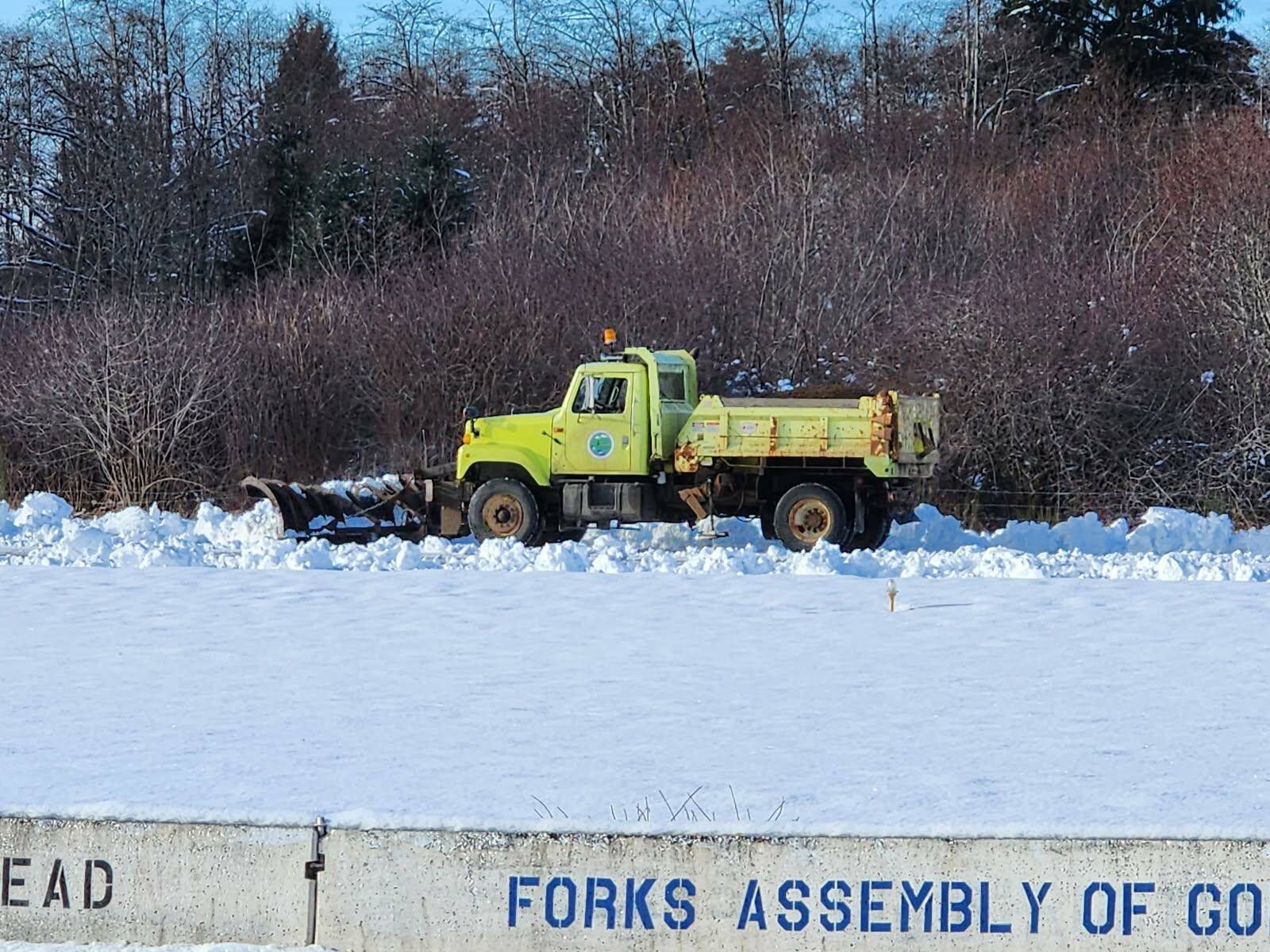 The city plow worked overtime trying to keep up with the 14.5 inches of snow recieved last week. Submitted photo