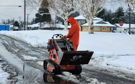 Submitted photo
City of Forks Public Works crew members kept sidewalks clear using some new equipment.