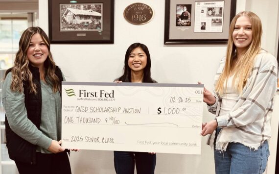 Submitted photo
First Federal in Forks wants to remind everyone it is time to start thinking about the upcoming Quillayute Valley Scholarship Auction on March 15 and 16 at the Forks High School commons. Each year, First Fed kicks off the giving with a big check! Accepting the check this year are FHS 2025 Seniors, left to right: Katelynn Wallerstedt, Moli Luong, and Faith Romberg.
These three are the 2025 Auction coordinators. Please watch for the FHS Senior class soliciting for donations. We look forward to seeing the Forks community at this year’s auction!