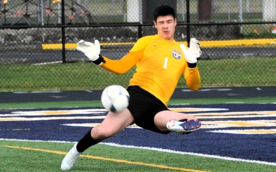 Photos by Lonnie Archibald
Spartan goalkeeper Juan Terrones doing his part in protecting the goal against the Roughriders.